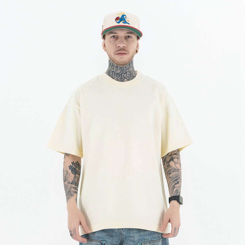 Model wearing a 100% Cotton Customizable Graphic Multi-Color Solid T-Shirt in front view