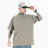 Model wearing a 100% Cotton Customizable Graphic Multi-Color Solid T-Shirt in front view