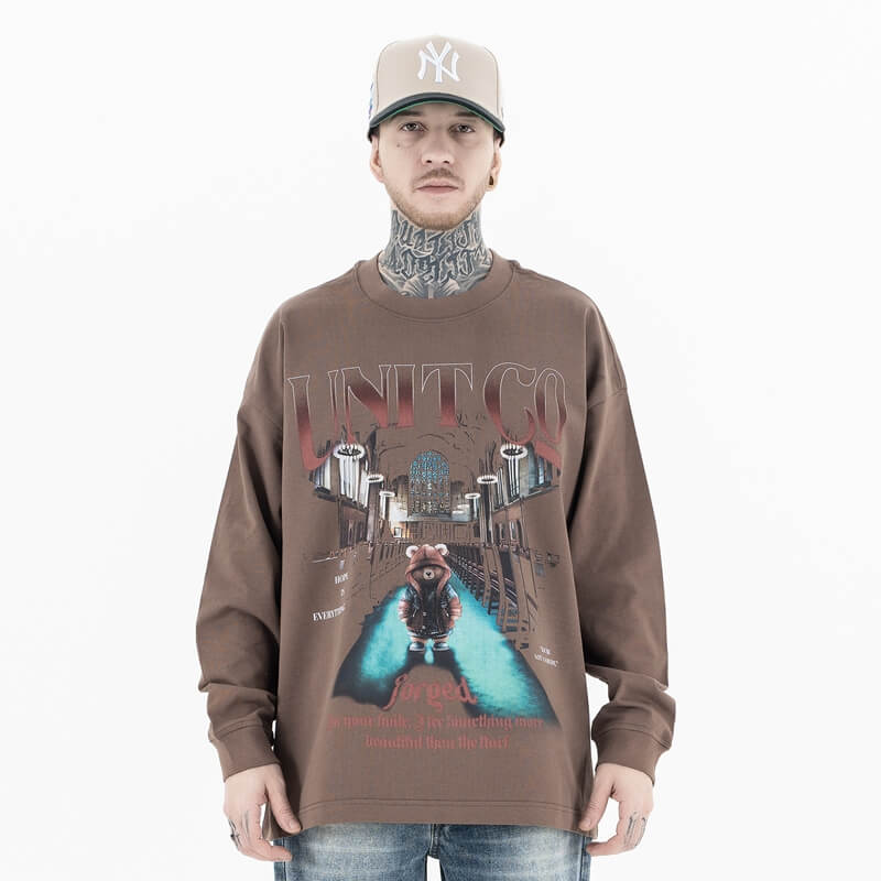 Front view of a model wearing a bear pure cotton long sleeve graphic T-shirt.