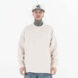 Model wearing front view of classic crew neck solid color custom long sleeve t-shirt.