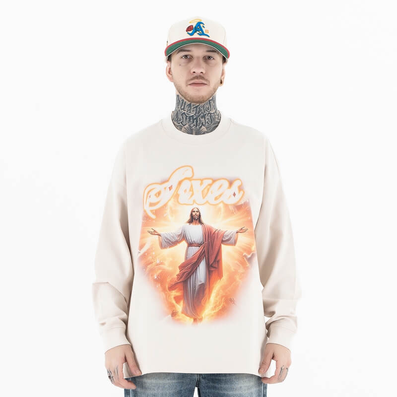 Front view of a model wearing a cotton Jesus graphic long sleeve T-shirt.