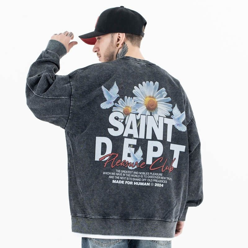 Back view of a model in a vintage floral graphic sweatshirt