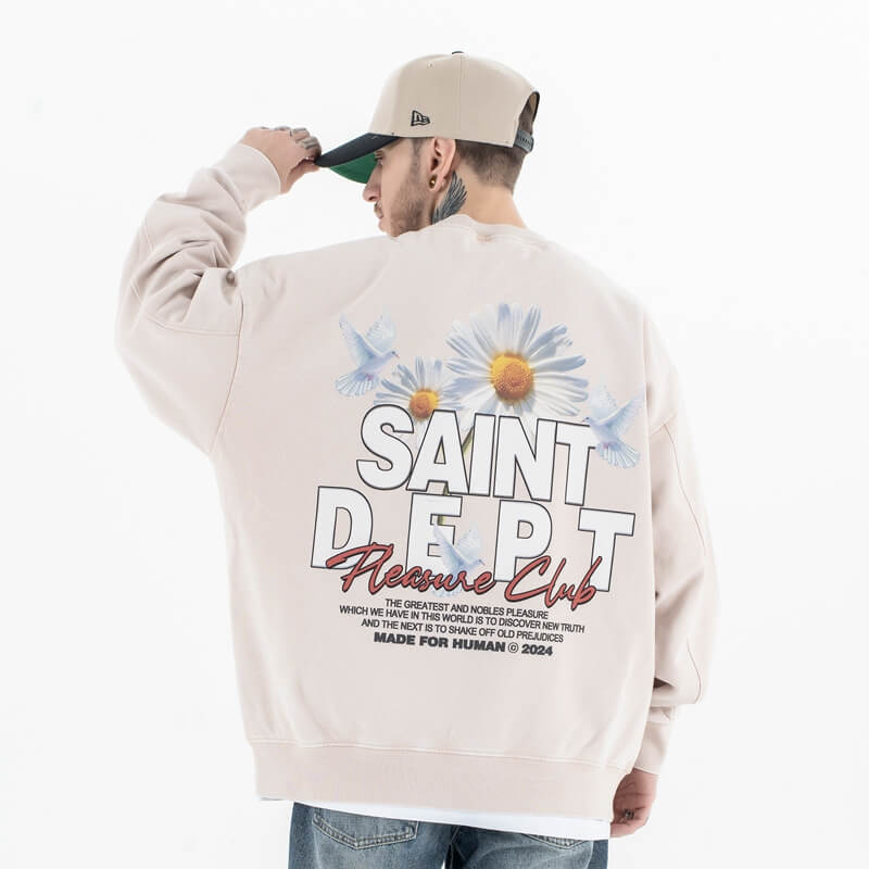 Back view of a model in a vintage floral graphic sweatshirt