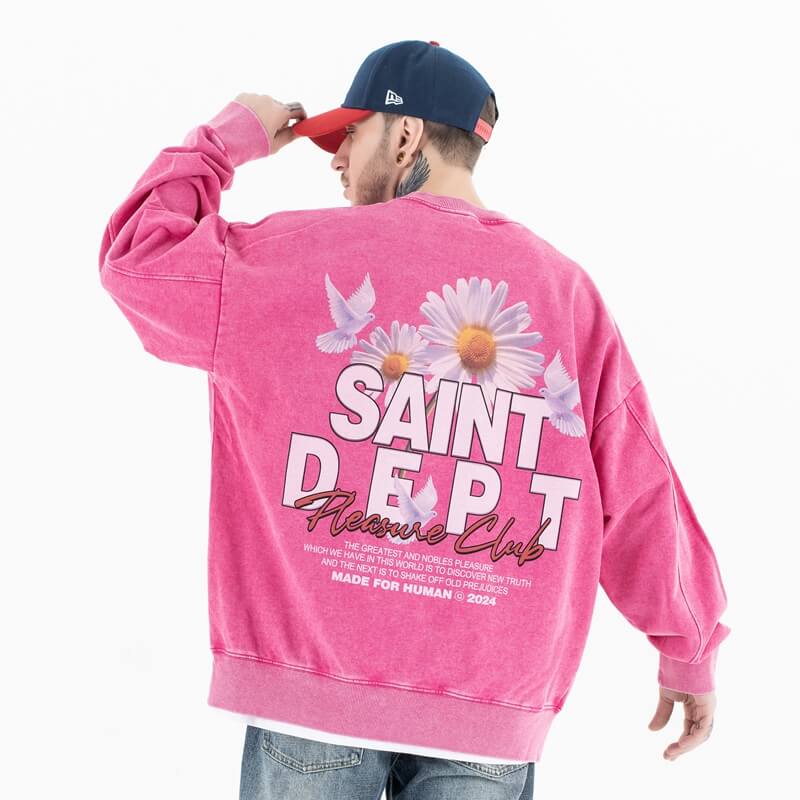 Back view of a model in a vintage floral graphic sweatshirt