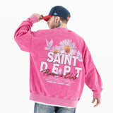 Back view of a model in a vintage floral graphic sweatshirt
