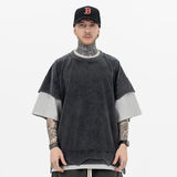 Front view of a model wearing a double collar solid color T-shirt.