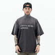 Model wearing front view of enfants riches deprimes vintage washed classic logo graphic t-shirt.