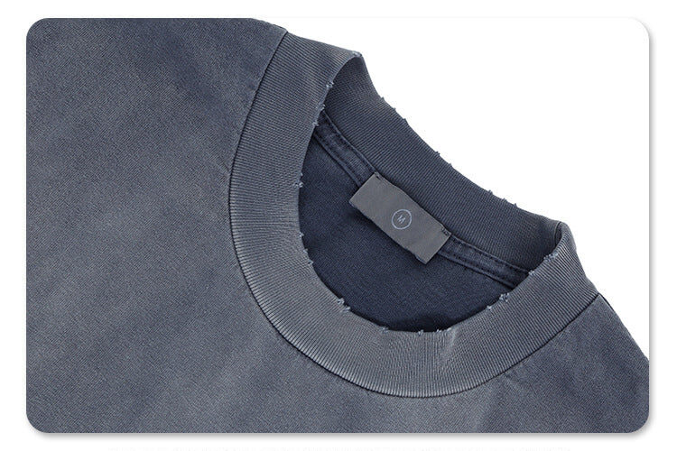 Collar detail of enfants riches deprimes vintage washed classic logo graphic t-shirt.