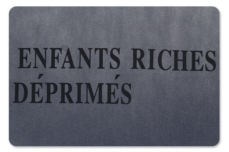 Front logo detail of enfants riches deprimes vintage washed classic logo graphic t-shirt.