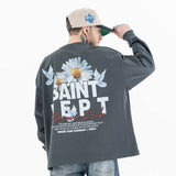 Back view of a model wearing a washed floral long sleeve graphic T-shirt