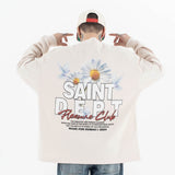 Back view of a model wearing a washed floral long sleeve graphic T-shirt