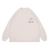 Flat lay of a washed floral long sleeve graphic T-shirt