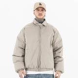 Model wearing front view of g9 harrington winter stand collar padded jacket.