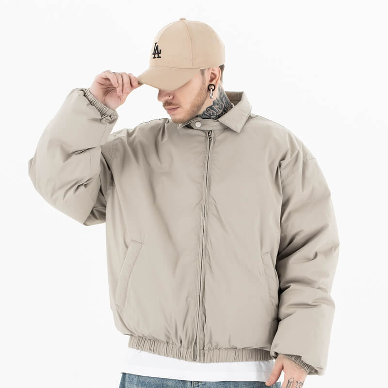 Model wearing front view of g9 harrington winter stand collar padded jacket.