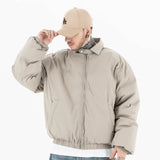 Model wearing front view of g9 harrington winter stand collar padded jacket.