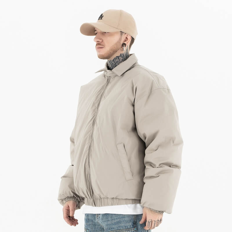 Model wearing side view of g9 harrington winter stand collar padded jacket.