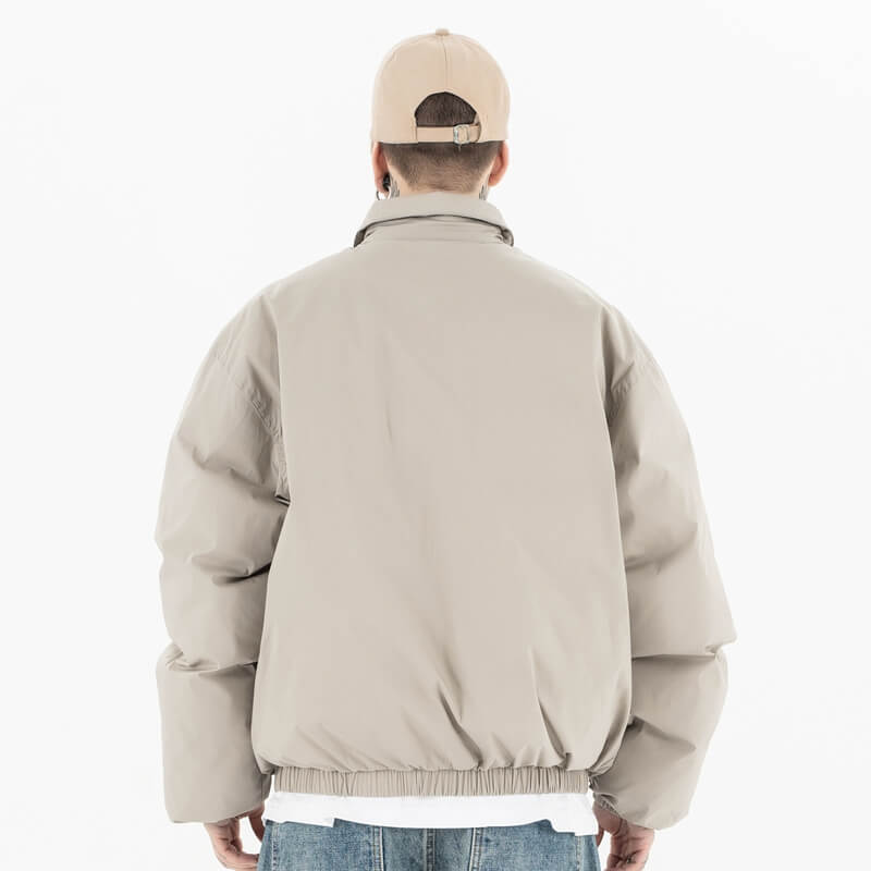 Model wearing back view of g9 harrington winter stand collar padded jacket.
