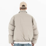 Model wearing back view of g9 harrington winter stand collar padded jacket.