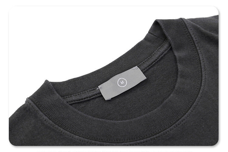 Collar detail of gallery dept gray car graphic t-shirt.