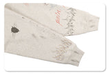 Close-up of sleeve detail on graffiti angel fleece graphic hoodie.