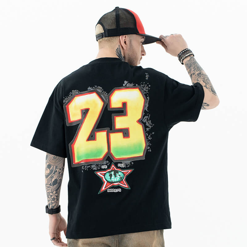 Model wearing Jordan 23 graphic T-shirt, back view highlighting clean and simple details