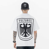 Model wearing back view of kanye west vultures graphic t-shirt.