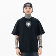 Model wearing front view of kanye west vultures graphic t-shirt.