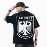 Model wearing back view of kanye west vultures graphic t-shirt.