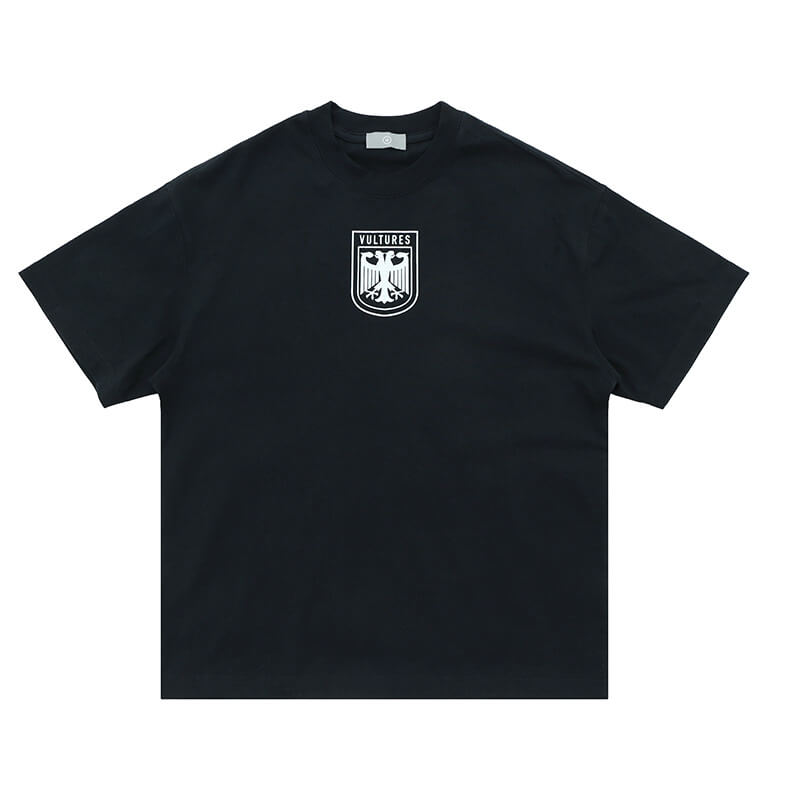 Flat lay of black kanye west vultures graphic t-shirt.