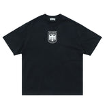 Flat lay of black kanye west vultures graphic t-shirt.