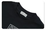 Collar detail of kanye west vultures graphic t-shirt.