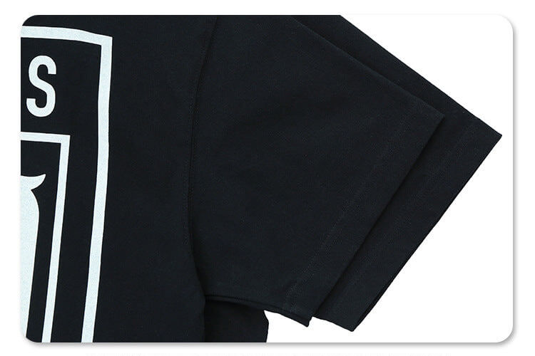 Sleeve detail of kanye west vultures graphic t-shirt.
