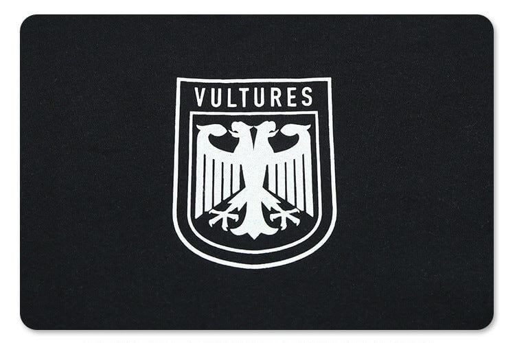 Graphic detail of kanye west vultures graphic t-shirt.