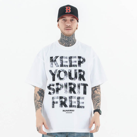 Front view of a model wearing a 'Keep Your Spirit Free' cotton graphic T-shirt