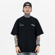 Model front view minimal art style 020 letter graphic t-shirt.