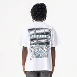 Model wearing back view of white qlacw brand street fashion graphic t shirt.