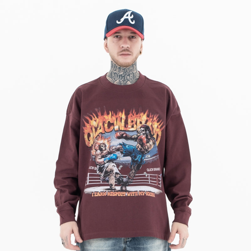Front view of a model wearing a 'QLACW' flame logo street cotton long sleeve T-shirt.