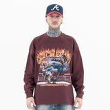 Front view of a model wearing a 'QLACW' flame logo street cotton long sleeve T-shirt.