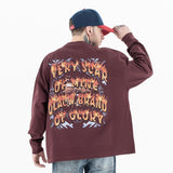 Back view of a model wearing a 'QLACW' flame logo street cotton long sleeve T-shirt.