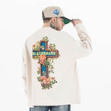 Back view of a model wearing a QLACW logo street cross long sleeve T-shirt