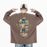 Back view of a model wearing a QLACW logo street cross long sleeve T-shirt