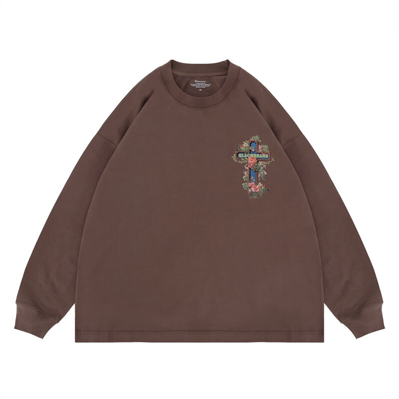 Flat lay of a QLACW logo street cross long sleeve graphic T-shirt