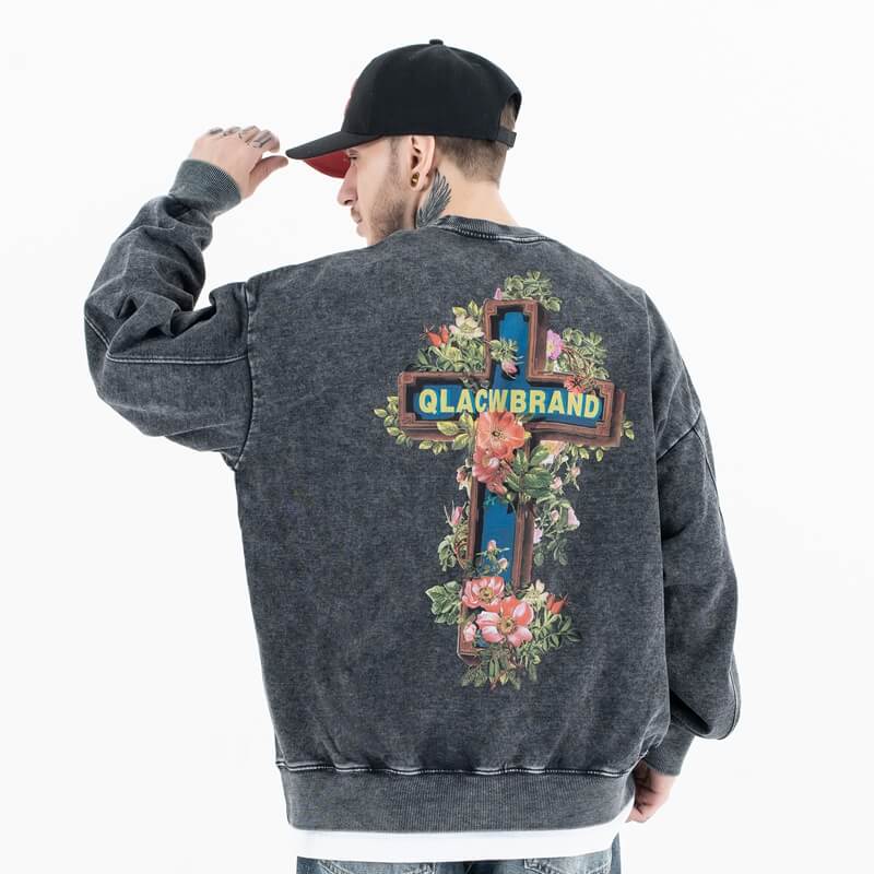 Back view of a model wearing a 'QLACW' vintage street graphic sweatshirt