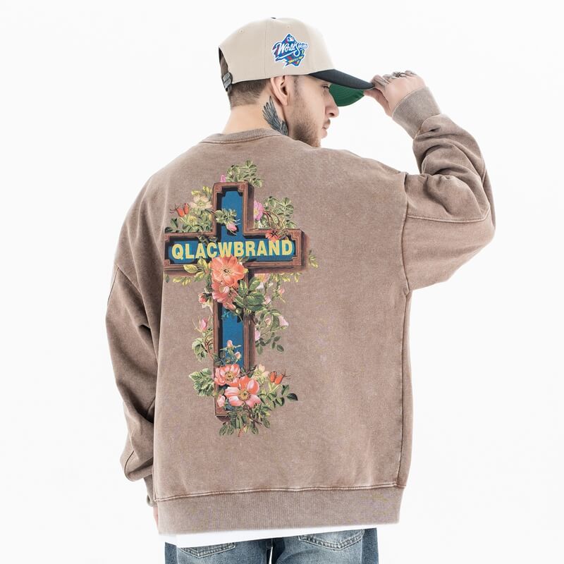 Back view of a model wearing a 'QLACW' vintage street graphic sweatshirt
