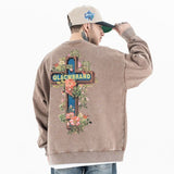 Back view of a model wearing a 'QLACW' vintage street graphic sweatshirt
