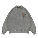 Flat lay of a 'QLACW' vintage street graphic sweatshirt