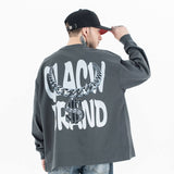 Back view of a model wearing a 'QLACW' personalized logo soft cotton long sleeve T-shirt