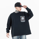 Front view of a model wearing a QLACW unique brand address graphic T-shirt