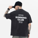 Model wearing back view of running club vintage graphic t-shirt.