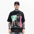 Front view of model wearing Saint Michael Kingdom Black Vintage Graphic T-Shirt.